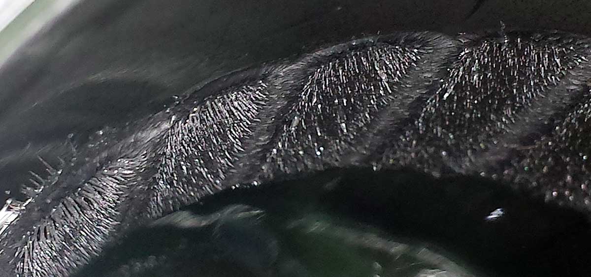 Close-up of millions of particles stranded together, captured and held by FilterMag.